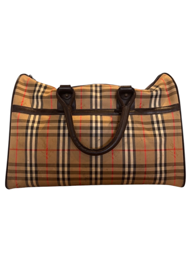 Posh Purse Co. classic plaid duffle bag in beige, black, red, and white with dark brown leather handles and trim.