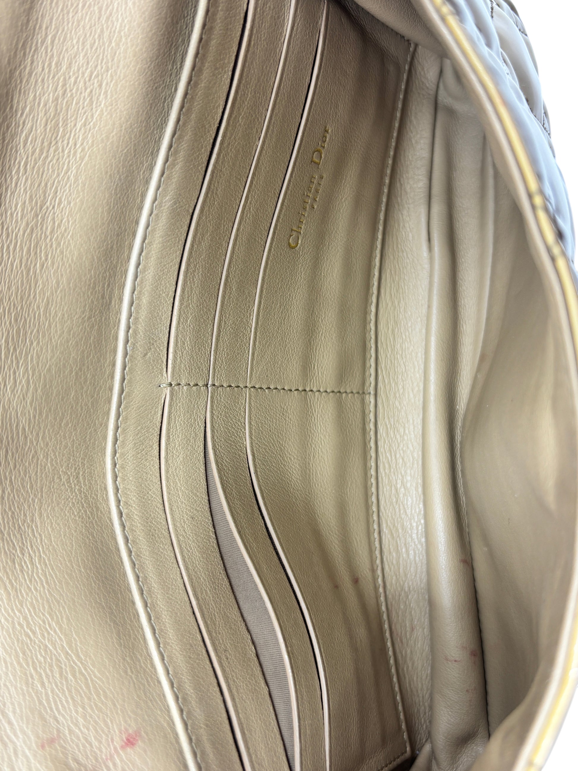 Interior of Posh Purse Co preloved Dior Miss Dior Promenade bag showing beige leather card slots and gold logo stamp