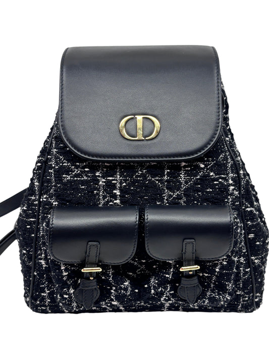 Posh Purse Co Dior Caro backpack in black tweed with signature Cannage pattern, leather trim, and gold CD hardware.