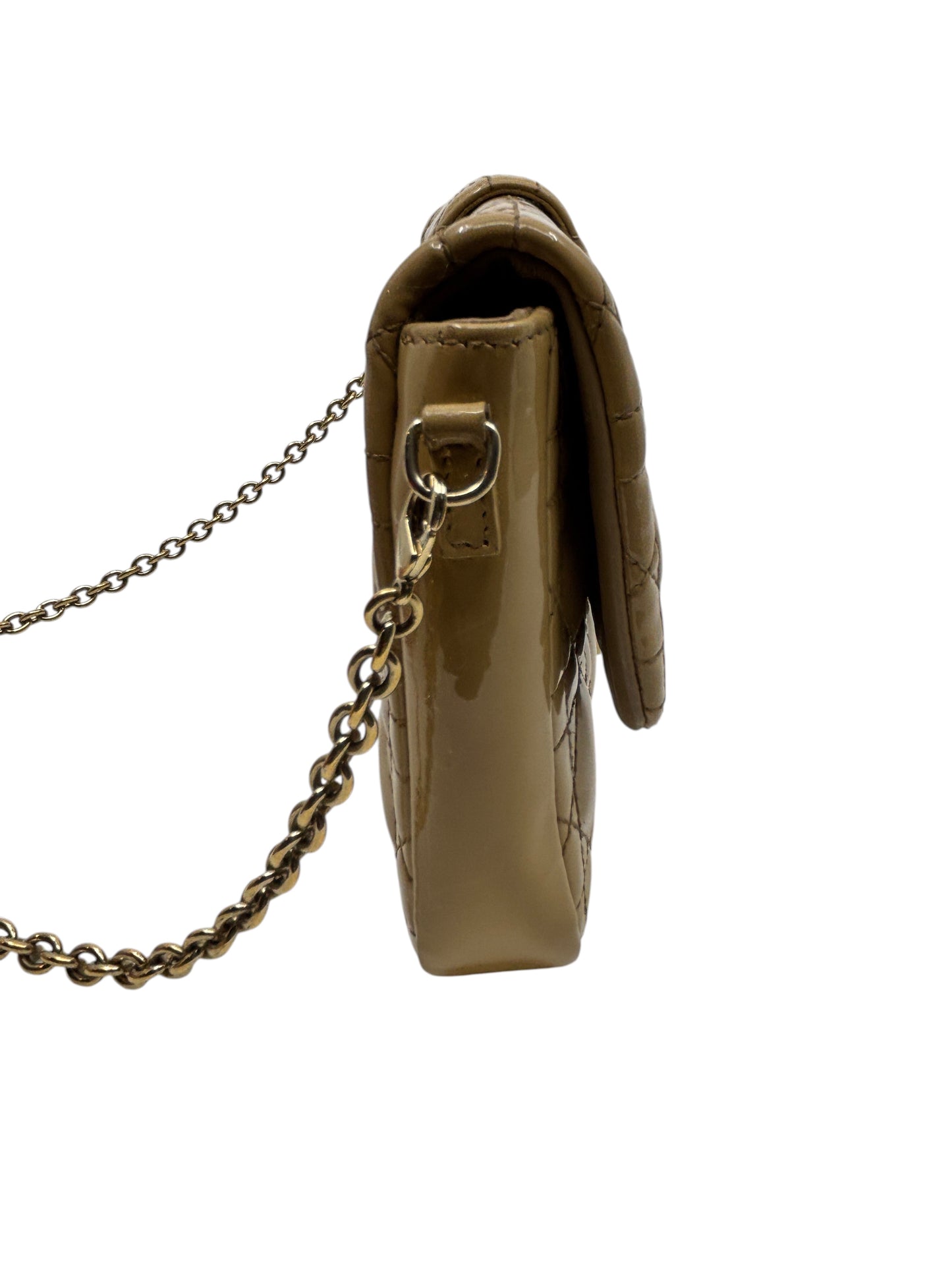 Side view of a beige patent leather Dior Miss Dior Promenade bag with Cannage quilting from Posh Purse Co