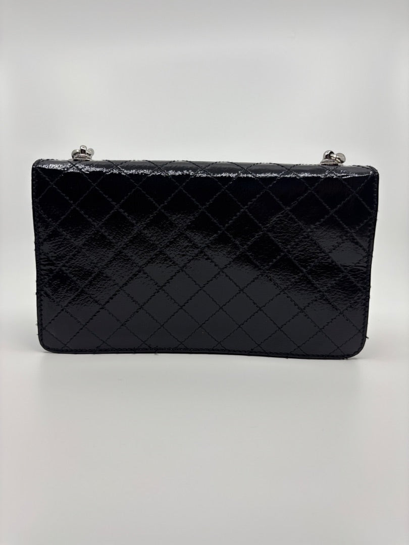Posh Purse Co. Dolce & Gabbana black patent leather shoulder bag with silver hardware and quilted stitching.