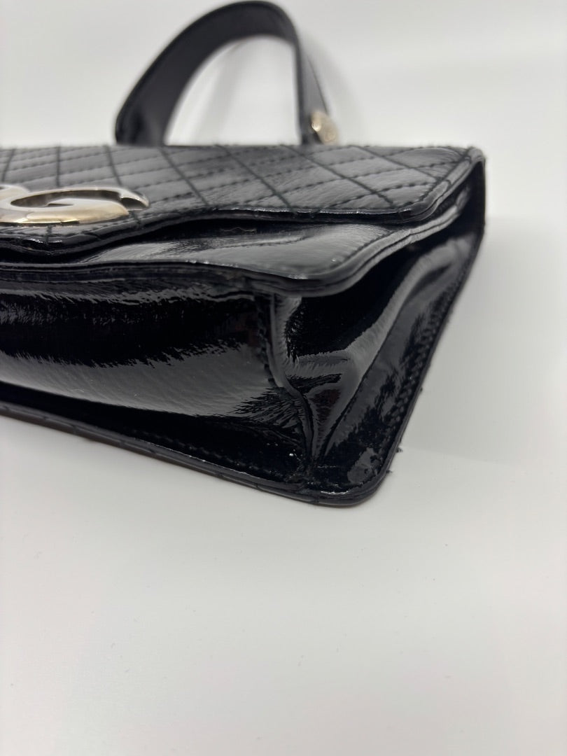 Posh Purse Co. black patent leather Dolce & Gabbana shoulder bag with silver D&G logo and silver hardware.