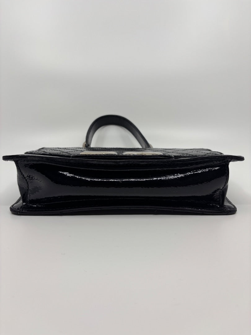 Posh Purse Co. Dolce & Gabbana black patent leather shoulder bag with silver hardware and D&G logo.
