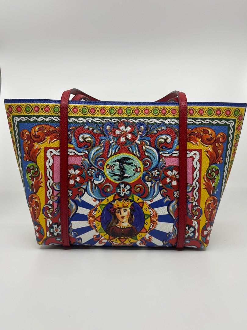 Posh Purse Co. Dolce & Gabbana Dauphine Escape tote bag with a colorful Renaissance-inspired print and red leather straps.