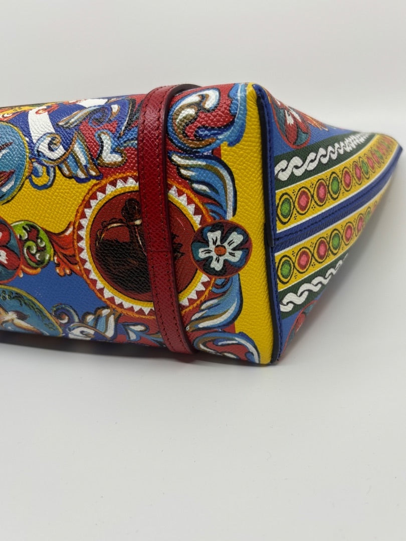 Posh Purse Co. Dolce & Gabbana Dauphine Escape tote bag with colorful print and red trim. Excellent condition.