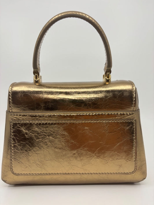 Posh Purse Co. Dolce & Gabbana small gold metallic leather top handle bag with structured silhouette.