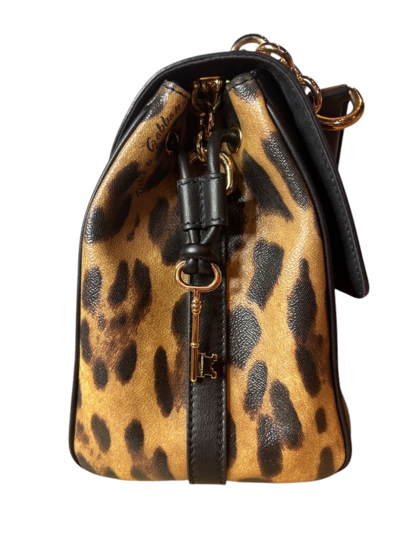 Posh Purse Co. Dolce & Gabbana leopard print leather handbag with gold chain and key charm.