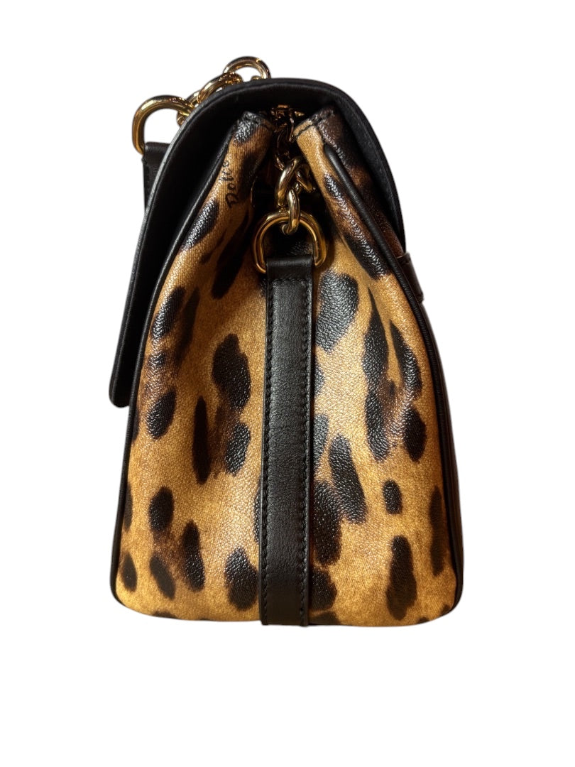 Posh Purse Co. Dolce & Gabbana leopard print leather shoulder bag with gold chain strap and black trim.