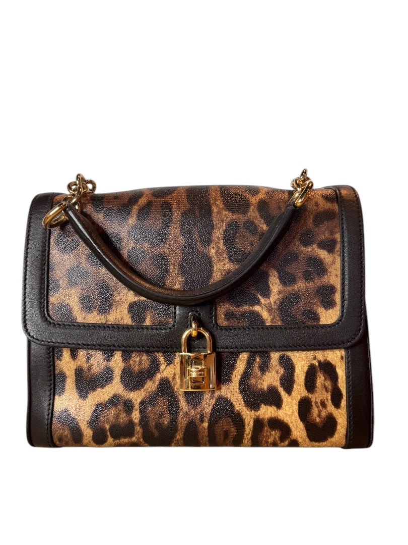 Posh Purse Co. Dolce & Gabbana leopard print leather handbag with gold lock and chain strap.
