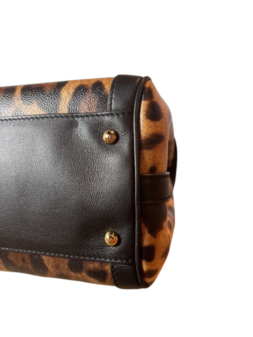Posh Purse Co. Dolce & Gabbana leopard print leather handbag with gold hardware and dark brown trim.