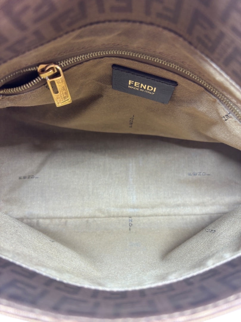 Interior of a Posh Purse Co vintage Fendi Mama Forever bag showing the fabric lining, zipper pocket, and Fendi tag.