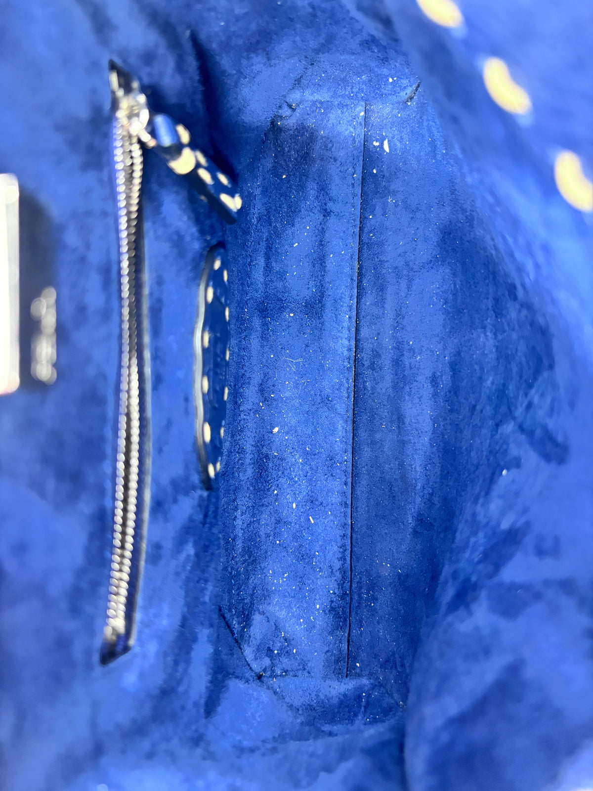 Interior of Posh Purse Co. Fendi Selleria Peekaboo Mini bag featuring blue suede lining and silver-tone hardware.