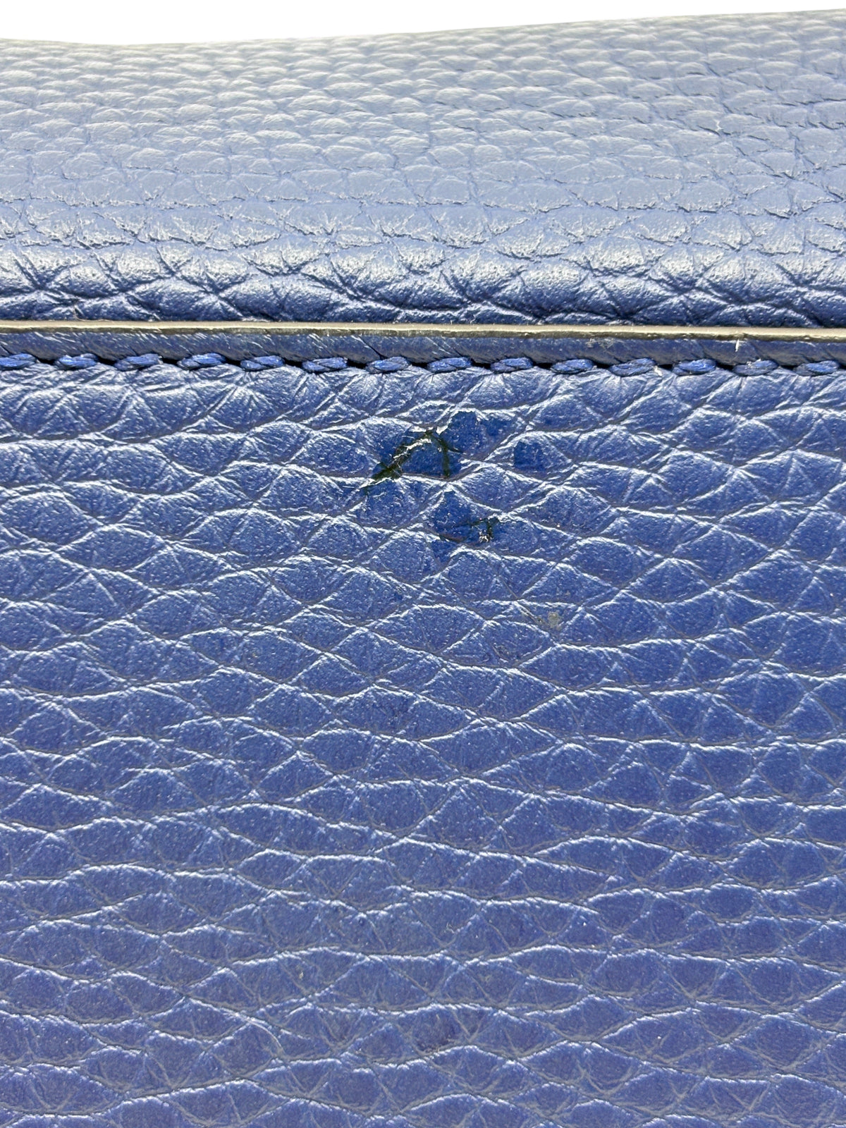 Close-up of blue leather surface wear and scratch on Posh Purse Co. Fendi Selleria Peekaboo Mini bag