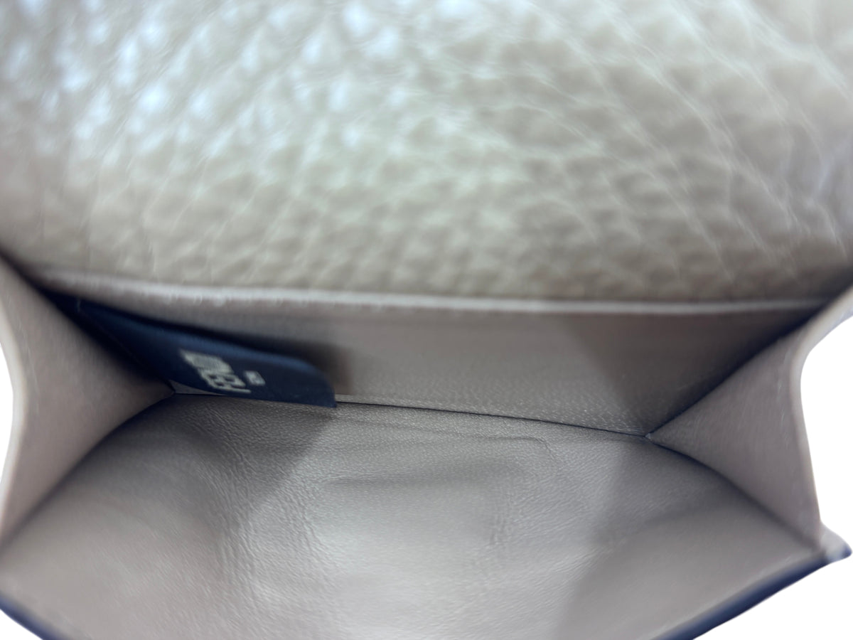 Interior of a Posh Purse Co Fendi Cuoio Romano taupe grained leather wallet showing the smooth lining and brand tag.