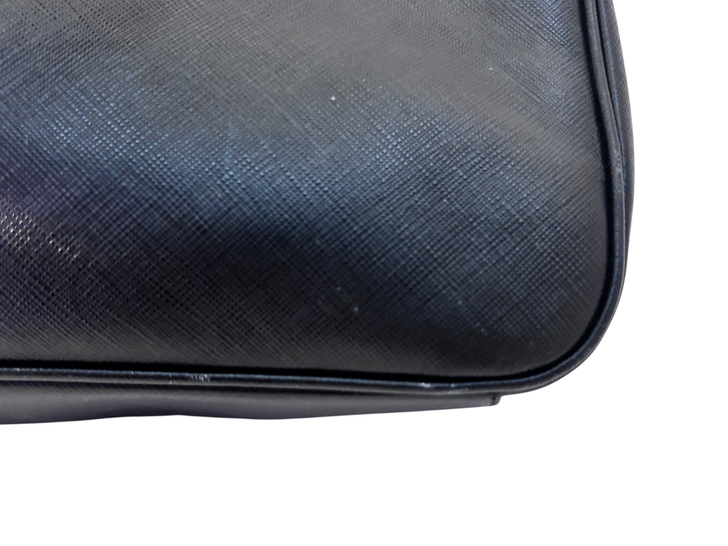 Close-up of the textured black leather corner of a Posh Purse Co preloved Ferragamo shoulder bag