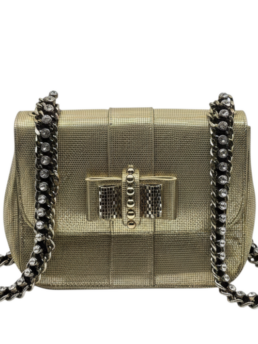 Posh Purse Co gold Christian Louboutin Sweet Charity backpack with crystal-embellished chain straps and bow detail.