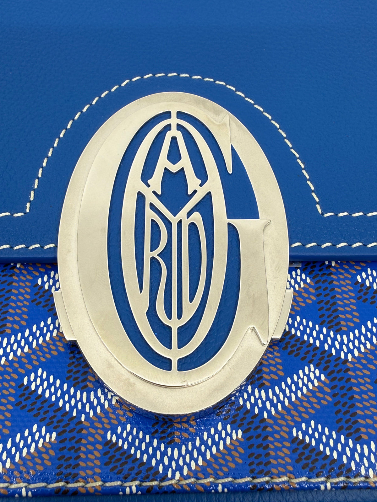 Posh Purse Co. blue Goyard 233 handbag featuring signature Goyardine canvas and a polished palladium-tone logo clasp.