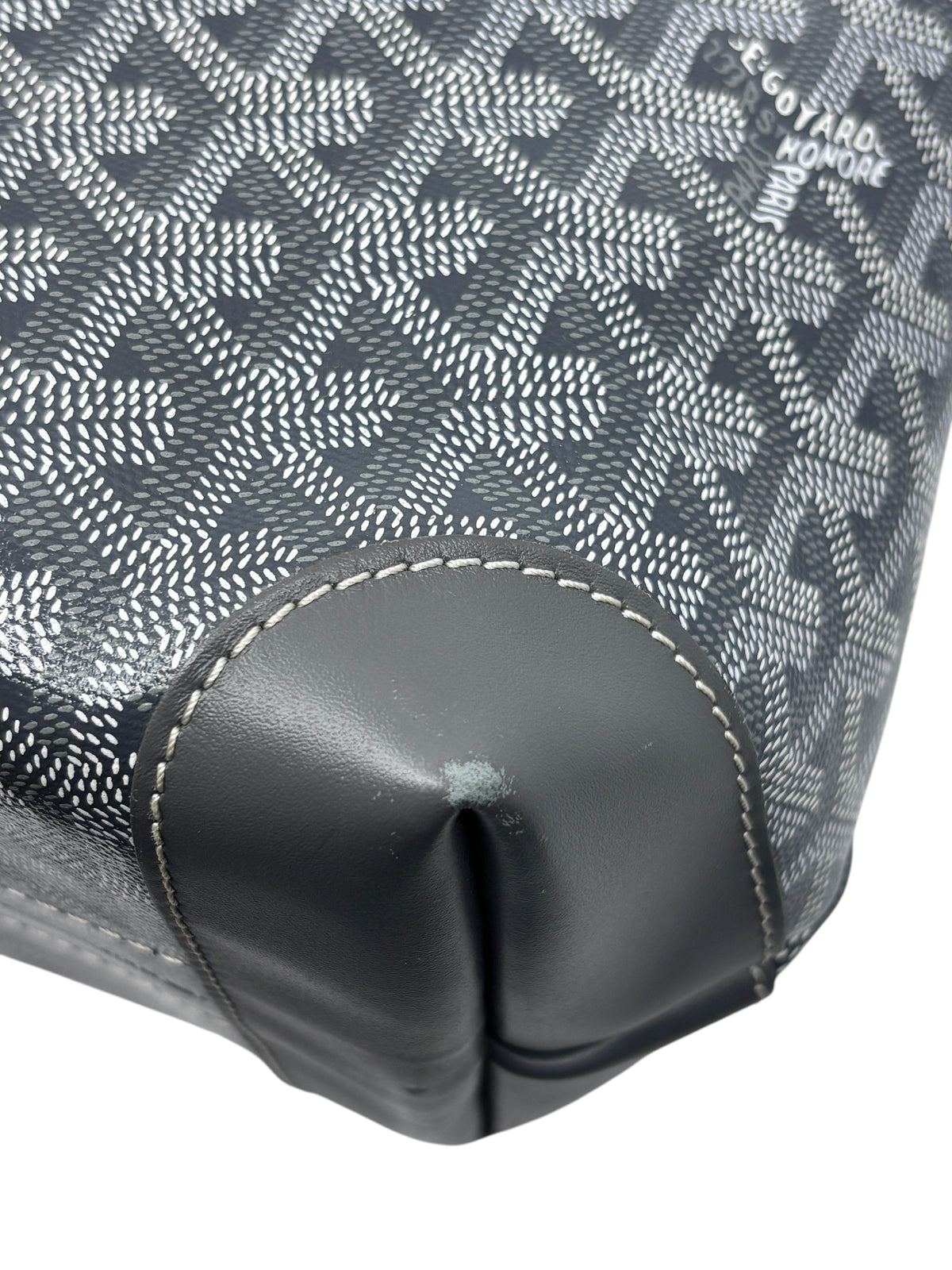 Posh Purse Co gray Goyard Bellechasse tote showing detail of the chevron Goyardine canvas and leather corner wear
