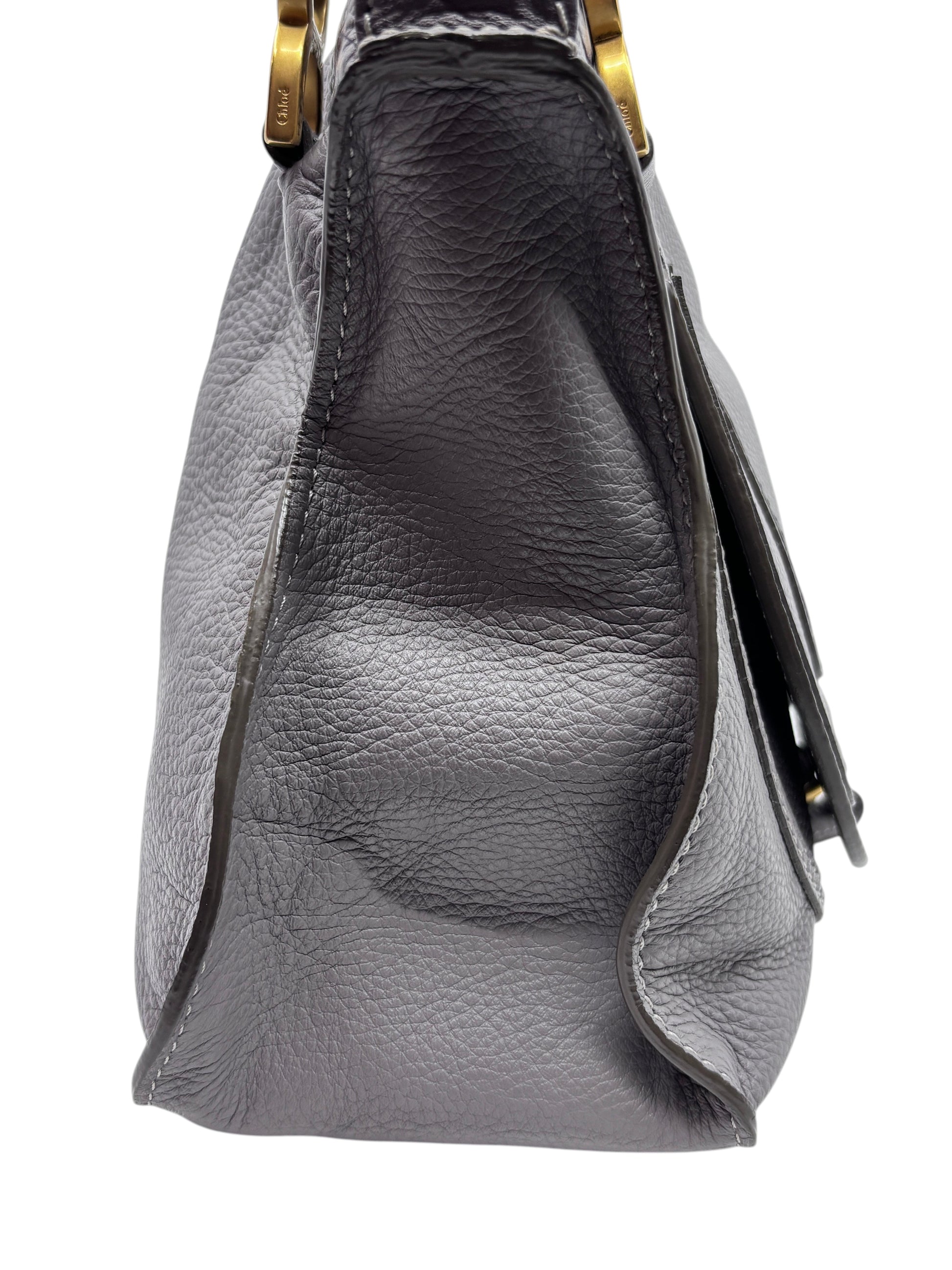 Side view of a gray leather Chloé Marcie medium satchel bag with gold hardware, sold by Posh Purse Co.