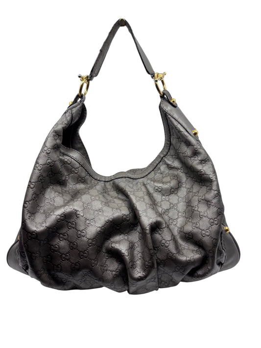 Posh Purse Co. pre-owned gray Gucci Jockey shoulder bag with embossed GG monogram leather and gold-tone hardware.