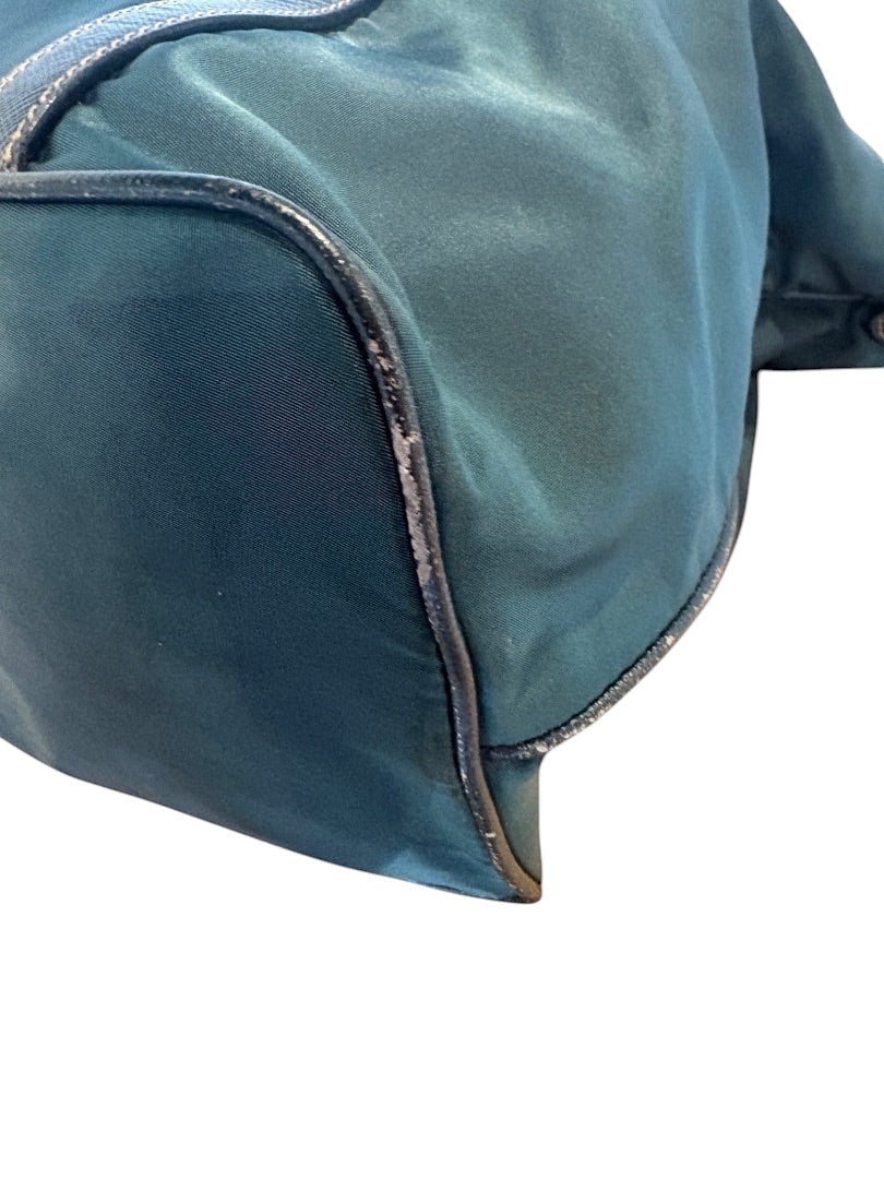 Posh Purse Co green Prada Nylon Tessuto bag with silver-tone hardware and iconic logo plaque.