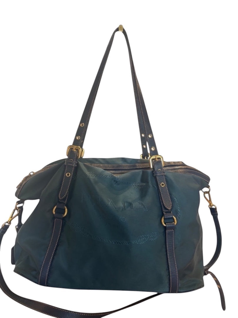 Posh Purse Co green Prada Tessuto nylon bag with silver-tone hardware and adjustable shoulder strap.