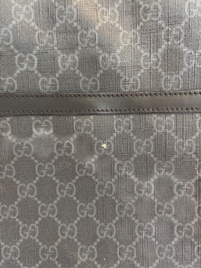 Posh Purse Co designer messenger bag in grey signature GG canvas with leather trim and striped adjustable strap.