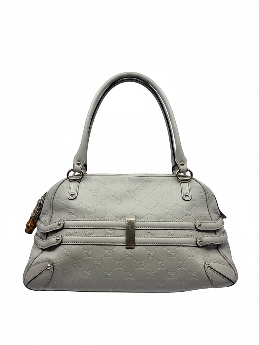 Posh Purse Co preloved grey Gucci Signature leather satchel with embossed GG logo and silver-tone hardware.