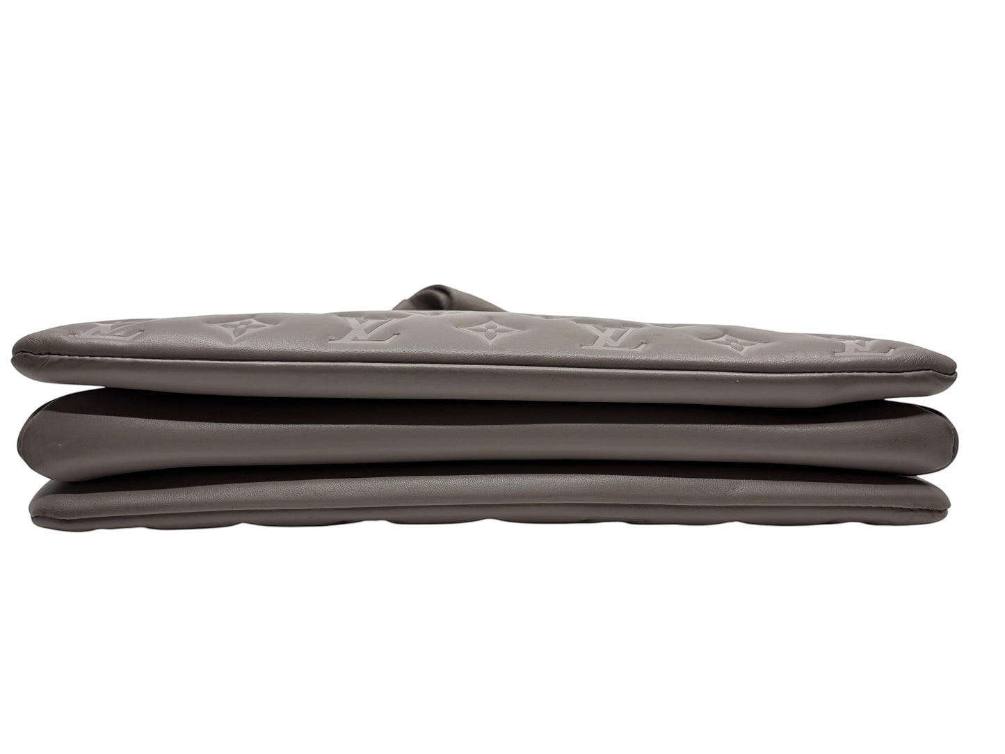 Posh Purse Co grey Louis Vuitton Coussin Large handbag in Monogram-embossed leather, side profile view.
