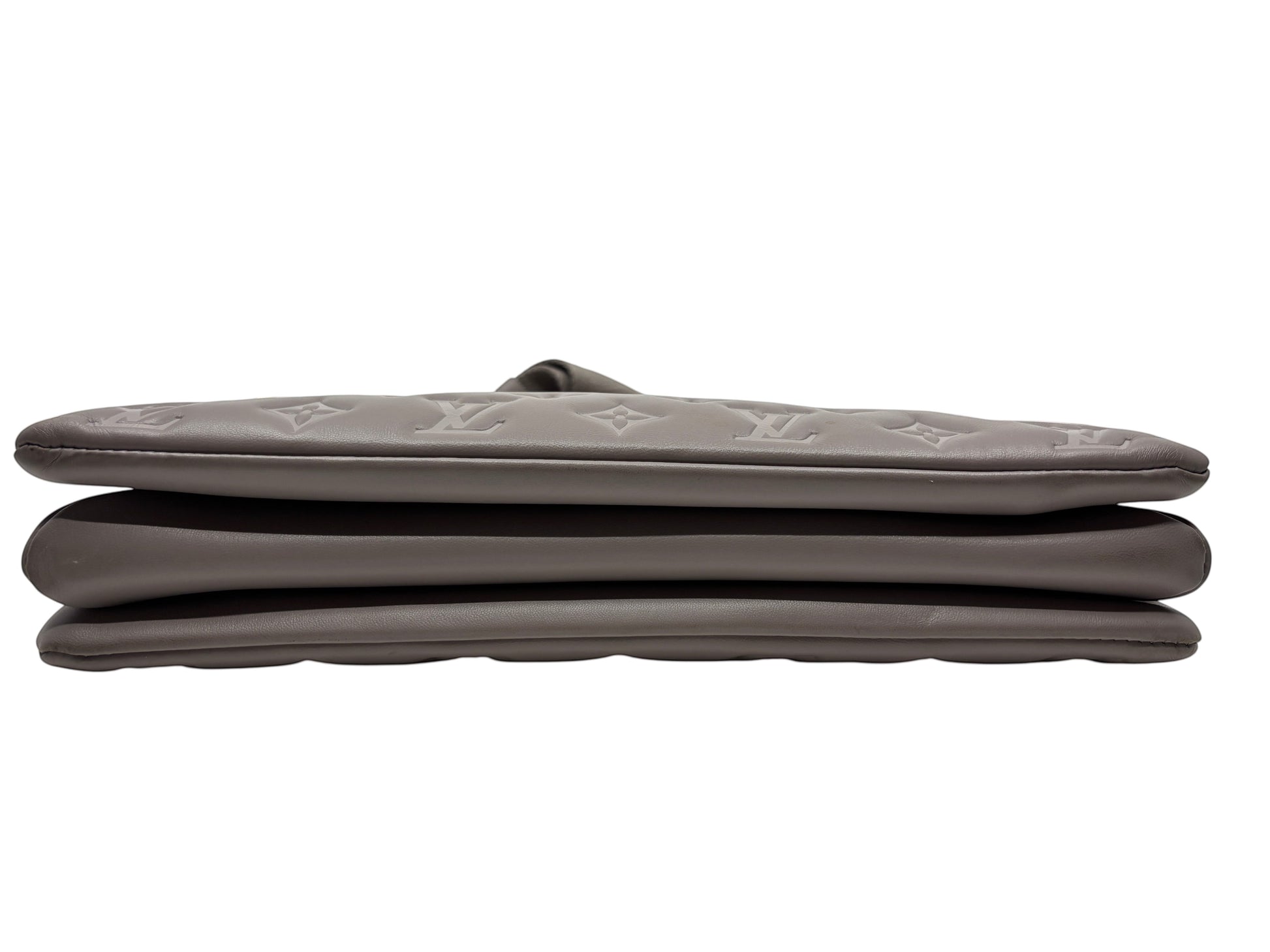 Posh Purse Co grey Louis Vuitton Coussin Large handbag in Monogram-embossed leather, side profile view.