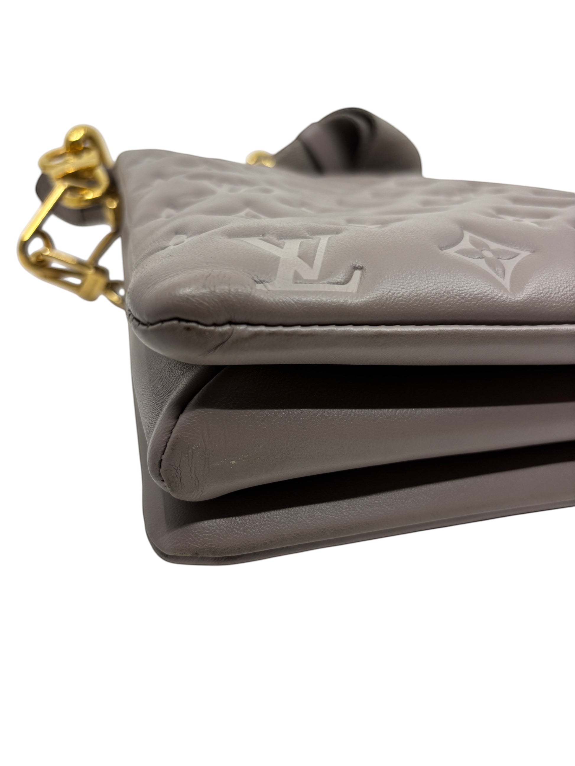 Posh Purse Co. grey Louis Vuitton Coussin large handbag in Monogram-embossed leather with gold hardware side view