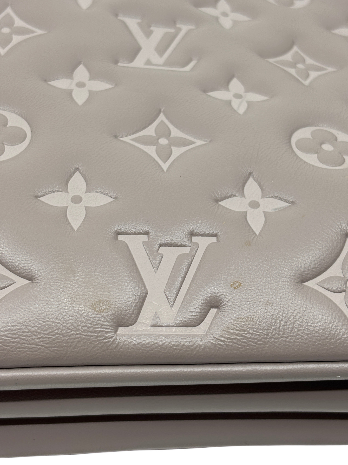 Posh Purse Co grey Louis Vuitton Coussin large handbag featuring plush Monogram-embossed leather detail.