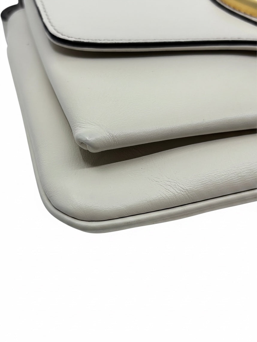 Posh Purse Co ivory Gucci Arli bag showing close-up of leather corner wear and smooth texture