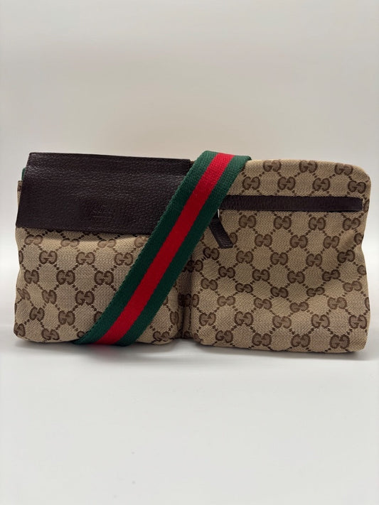 Posh Purse Co Gucci belt bag in beige GG Supreme canvas with brown leather trim and iconic green and red web stripe strap.