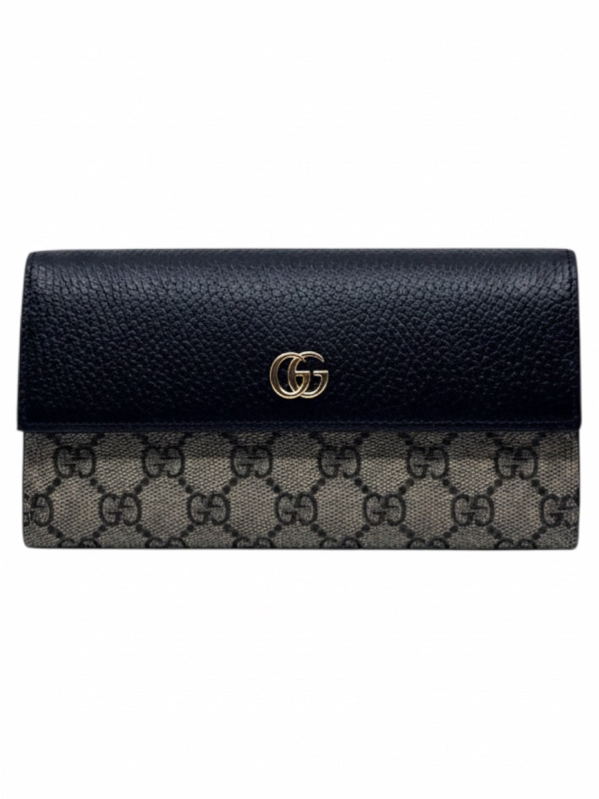 Posh Purse Co preloved Gucci bicolor continental wallet featuring black leather and signature GG monogram canvas