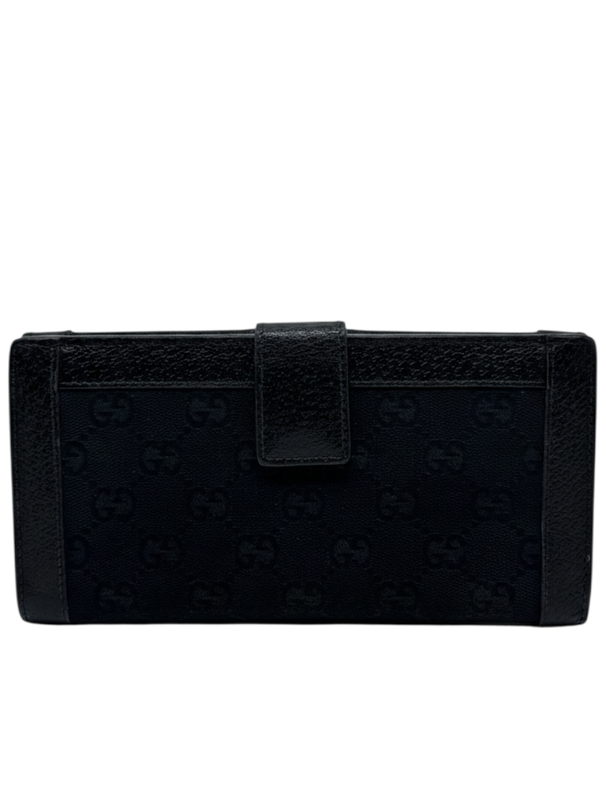 Posh Purse Co. preloved black Gucci continental wallet with signature monogram canvas and leather trim
