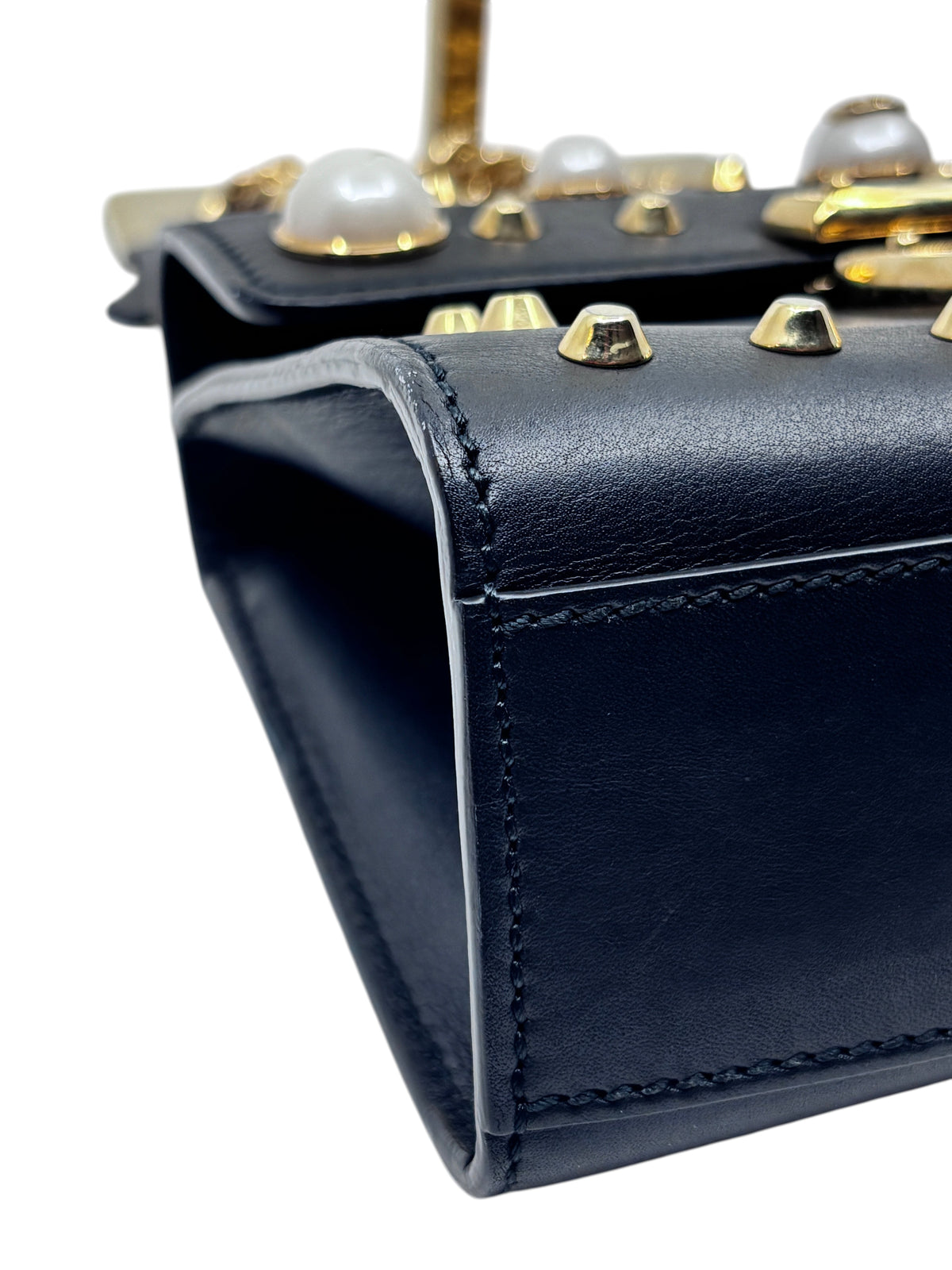 Posh Purse Co black Gucci shoulder bag featuring gold-tone hardware and pearl embellishments on leather