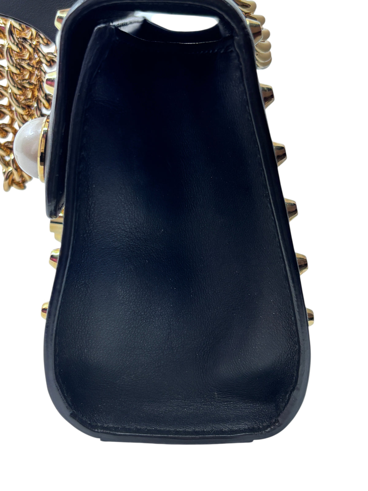 Posh Purse Co black Gucci shoulder bag side view featuring gold hardware and pearl embellishments