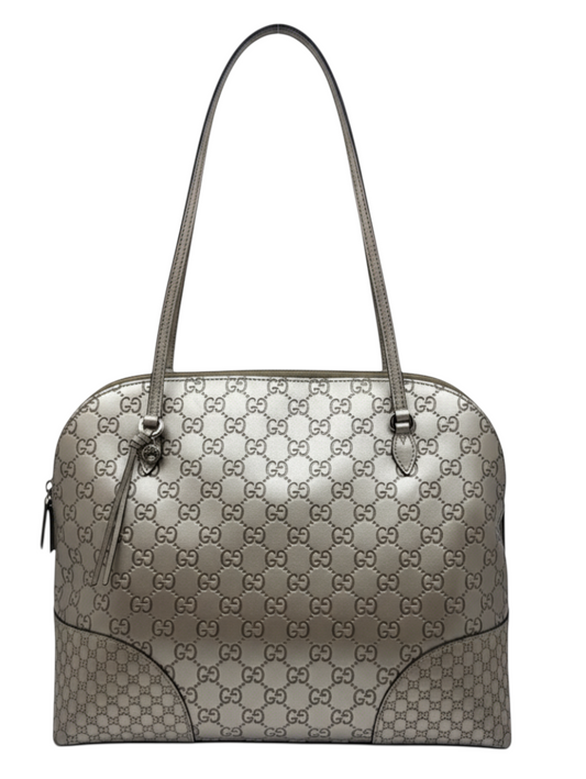 Posh Purse Co. Gucci Micro Guccissima Bree shoulder bag in metallic gold embossed leather with dual top handles.