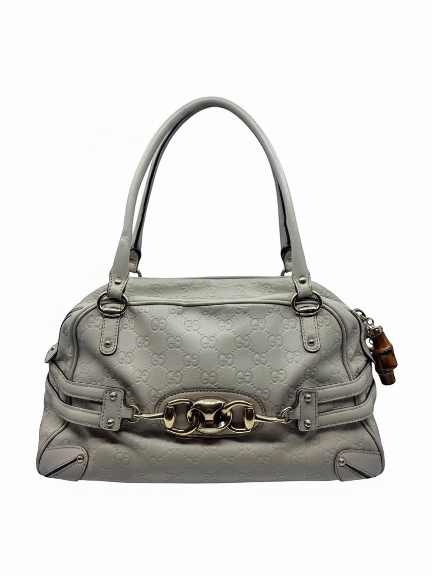 Posh Purse Co preloved grey Gucci Signature leather satchel with iconic Horsebit hardware and bamboo tassel detail.