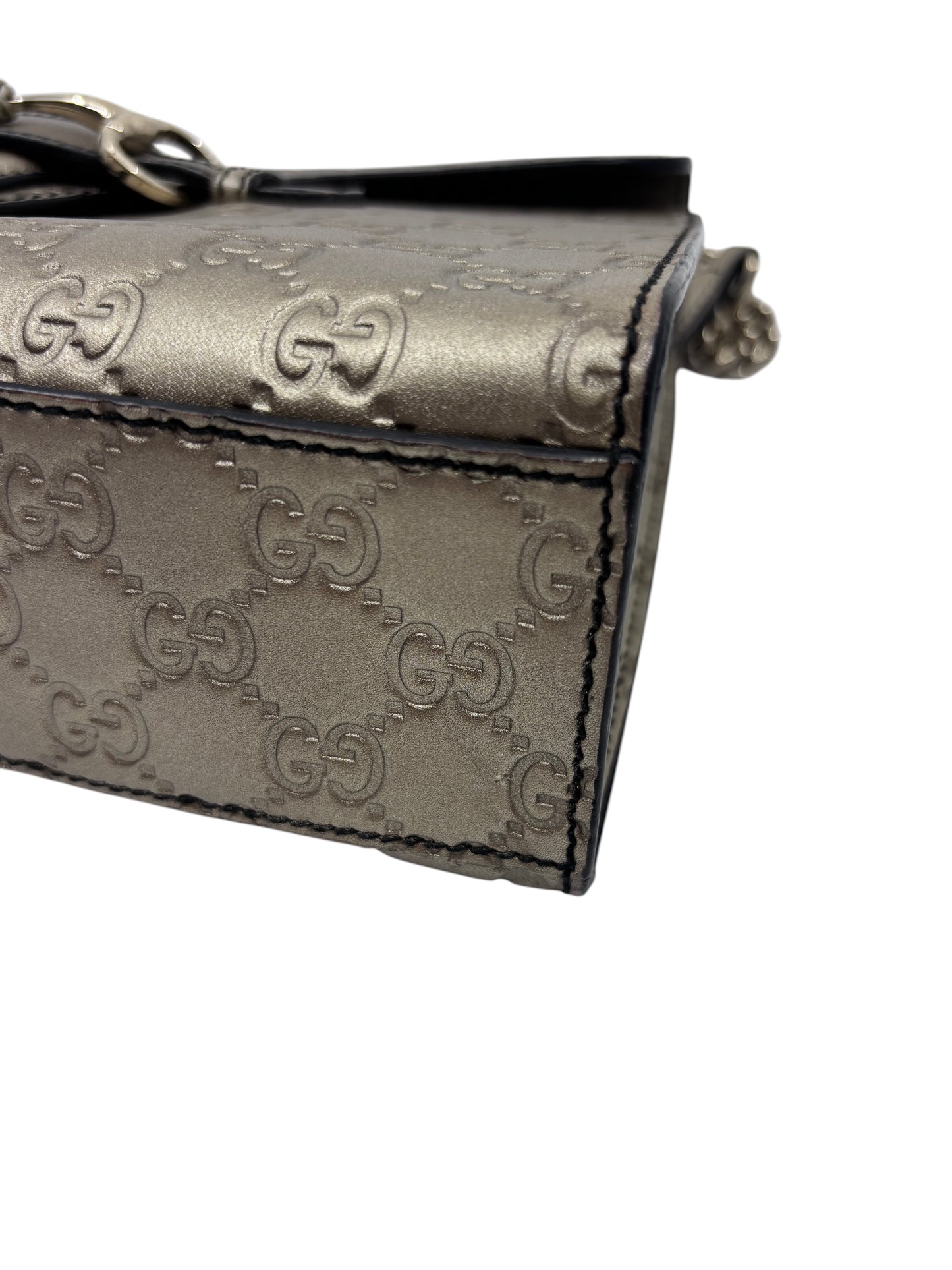 Posh Purse Co. Gucci Guccissima Emily shoulder bag in metallic embossed leather with signature GG monogram detail