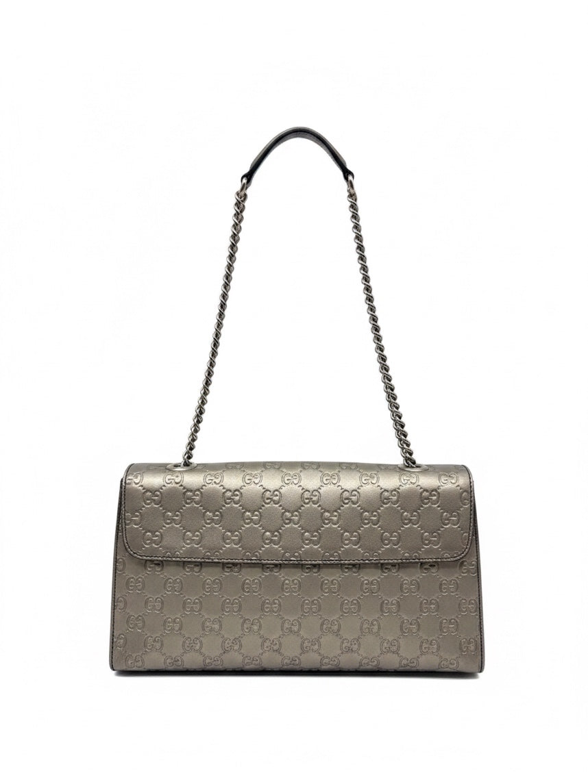Posh Purse Co. Gucci Guccissima Emily shoulder bag in metallic leather with GG monogram and chain-link strap.