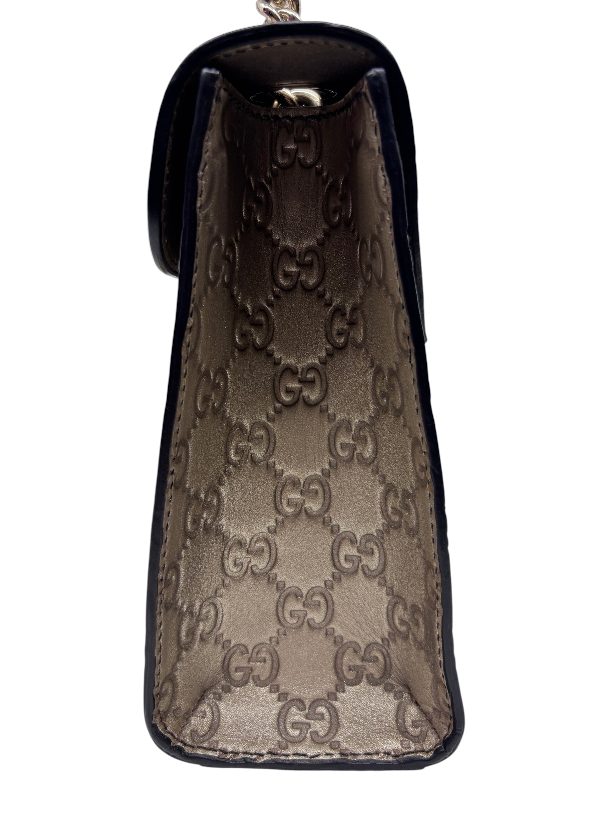 Side view of a Posh Purse Co. Gucci Guccissima Emily shoulder bag in metallic embossed leather with GG monogram.