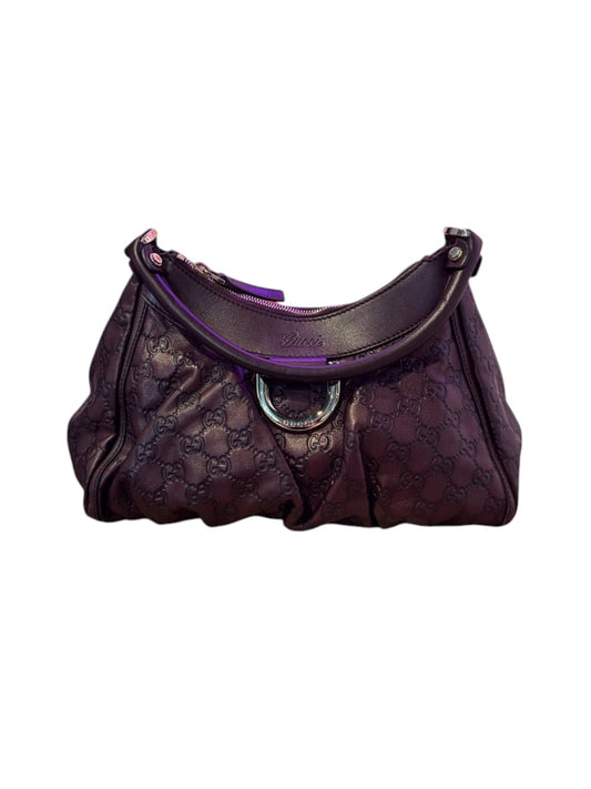 Posh Purse Co. dark purple embossed Guccissima leather hobo bag with silver hardware and Gucci logo detail.