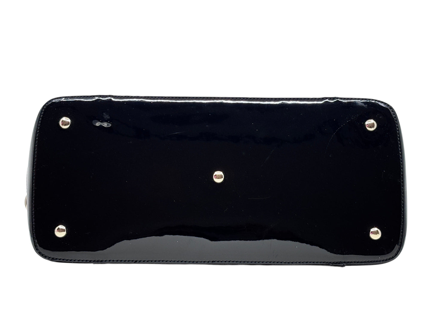 Base view of a black Posh Purse Co Gucci Micro Guccissima handbag showing protective metal feet on the leather bottom