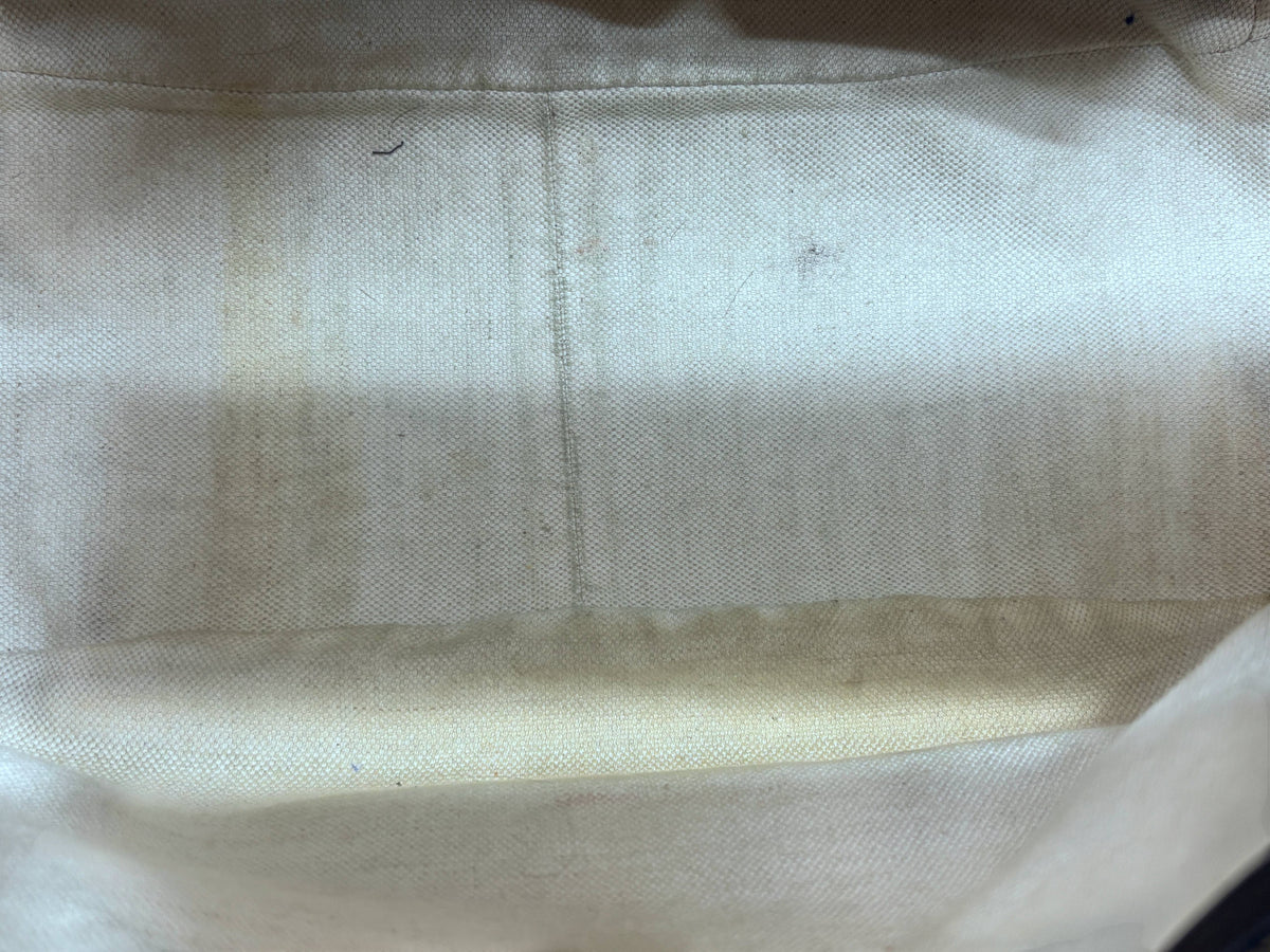 Interior lining of a preloved Posh Purse Co. Gucci Horsebit 1955 hobo bag showing visible staining on fabric