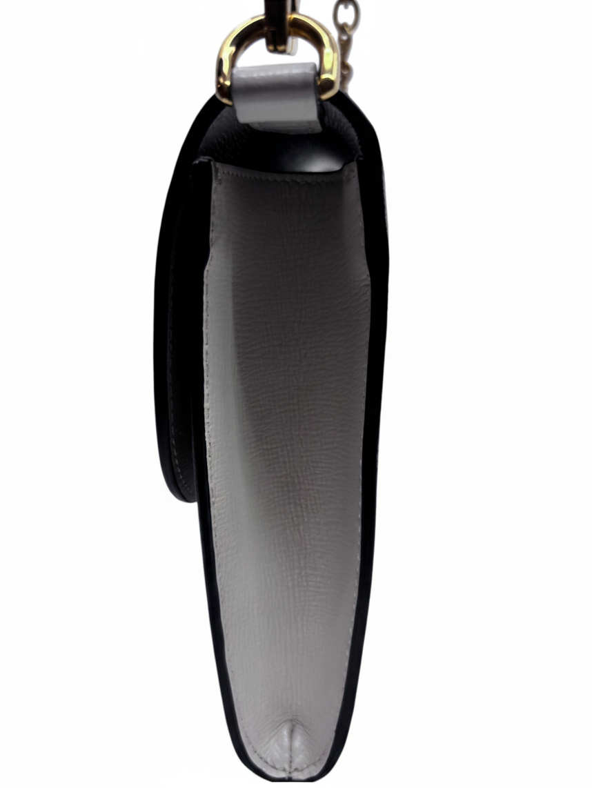 Side profile of a Posh Purse Co. Gucci Horsebit 1955 shoulder bag showing the structured leather and gold hardware.