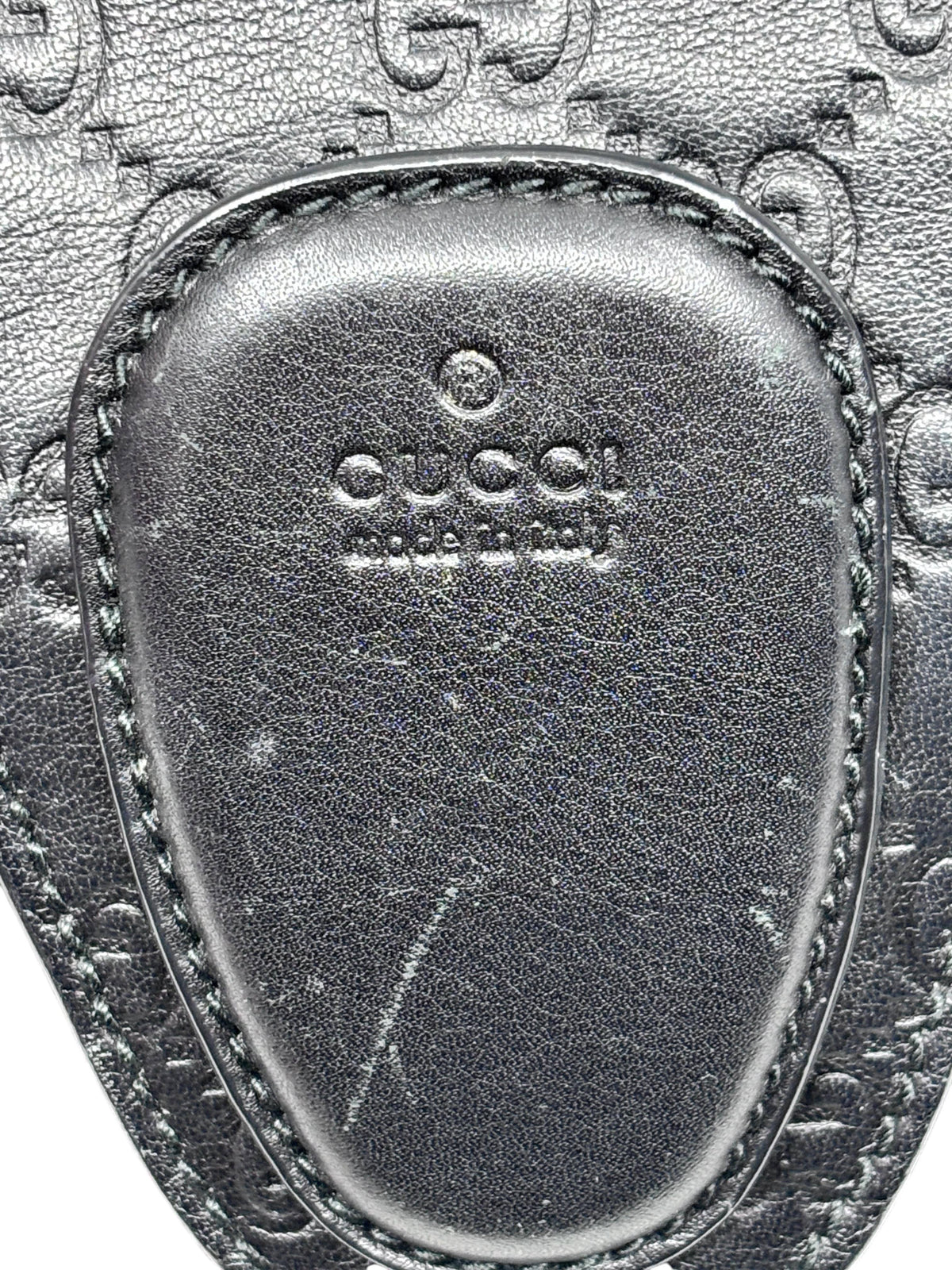 Posh Purse Co. black leather Gucci Horsebit 1955 hobo bag showing the embossed logo and made in Italy stamp