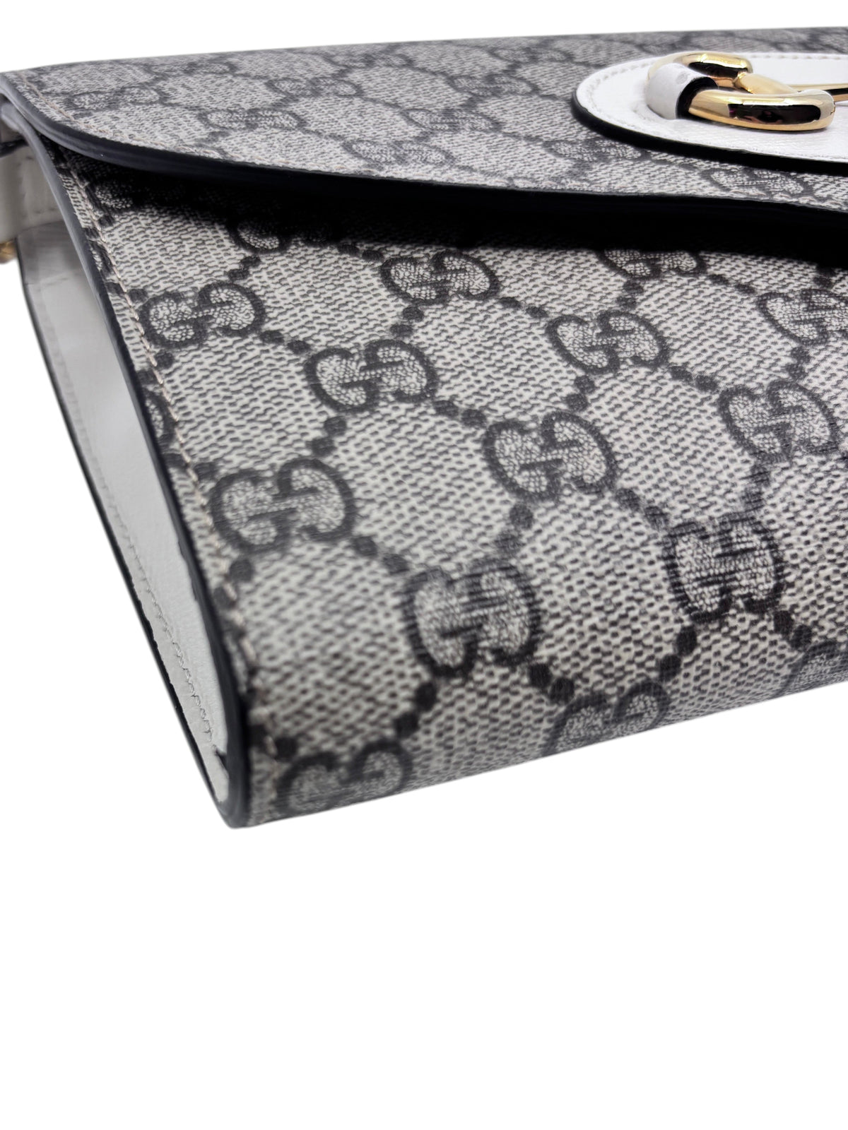 Posh Purse Co. Gucci Horsebit 1955 shoulder bag in grey GG Supreme monogram canvas with gold hardware detail.