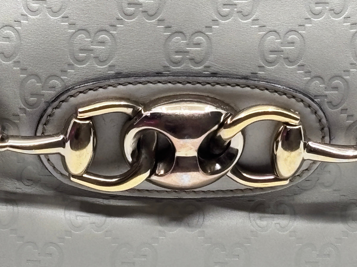 Posh Purse Co preloved Gucci Horsebit Wave bag featuring signature gold-tone hardware and embossed GG leather detail